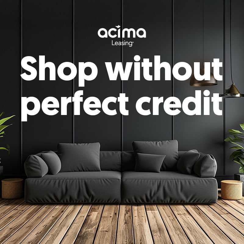 Modern dark living room with black sectional sofa and Acima Leasing advertisement text saying “Shop without perfect credit.