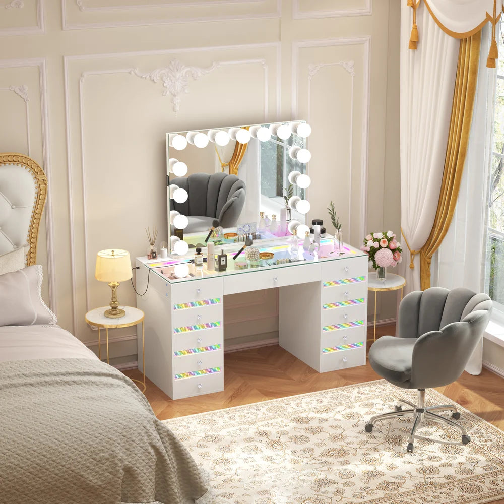 Dressing table with mirror and lights in a bedroom setting