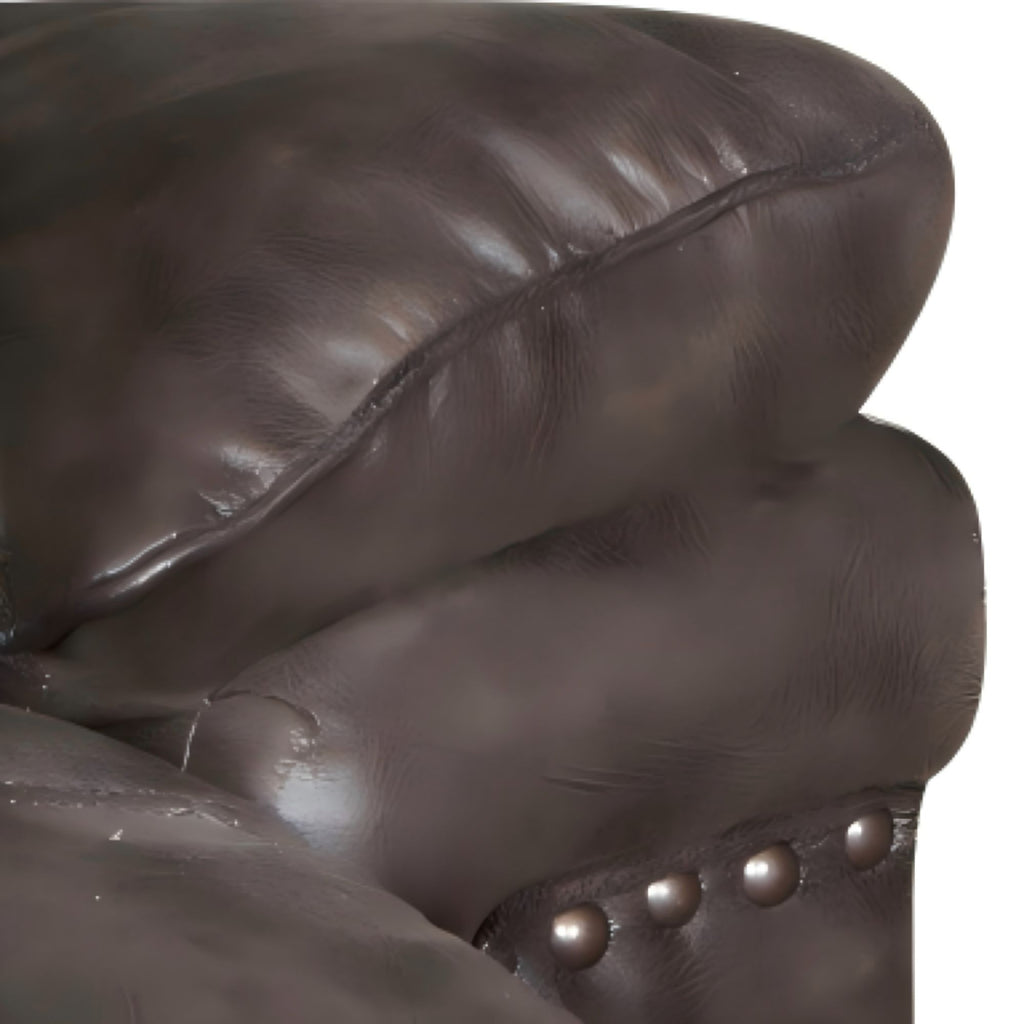Close-up of a brown leather armchair with studded details on a white background