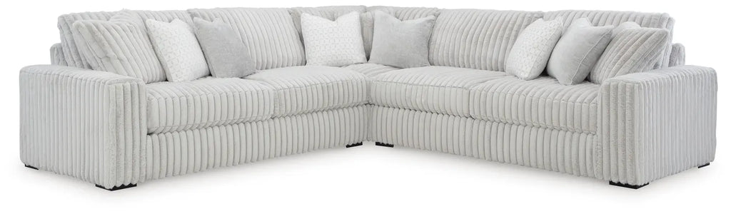 Light gray L shaped sectional on a white background.