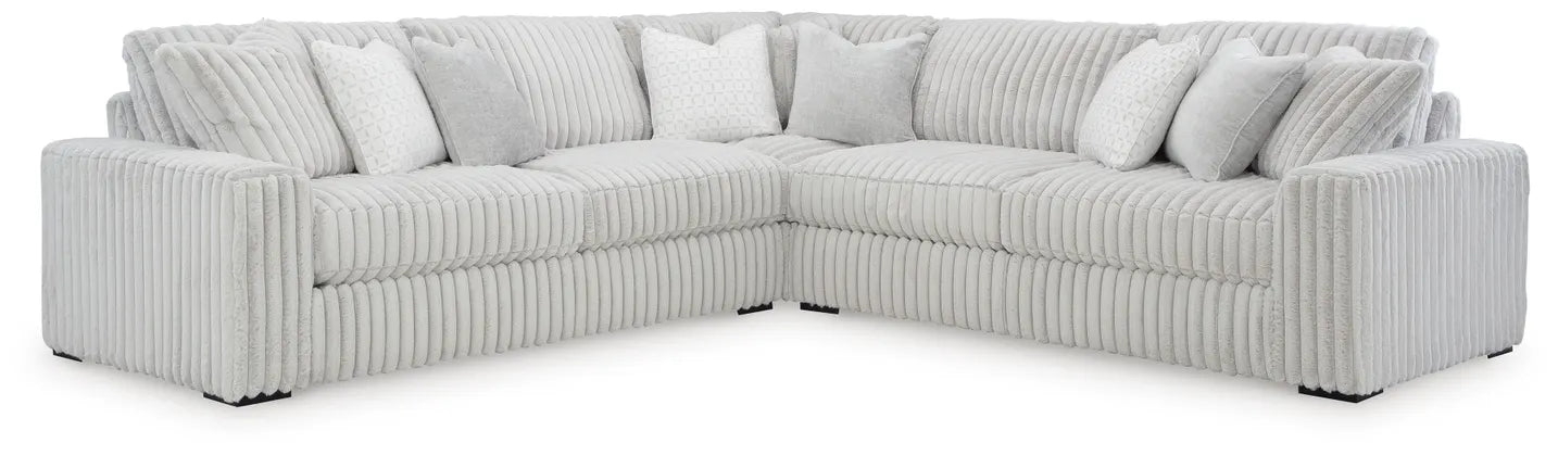 Light gray L shaped sectional on a white background.