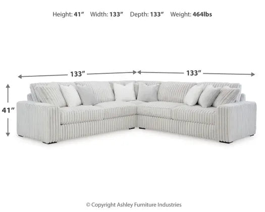 Dimensions drawn on a light gray L shaped sectional on a white background