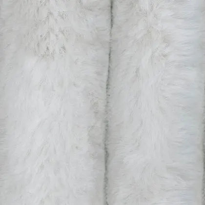 Close up photo of a light gray corduroy fabric.