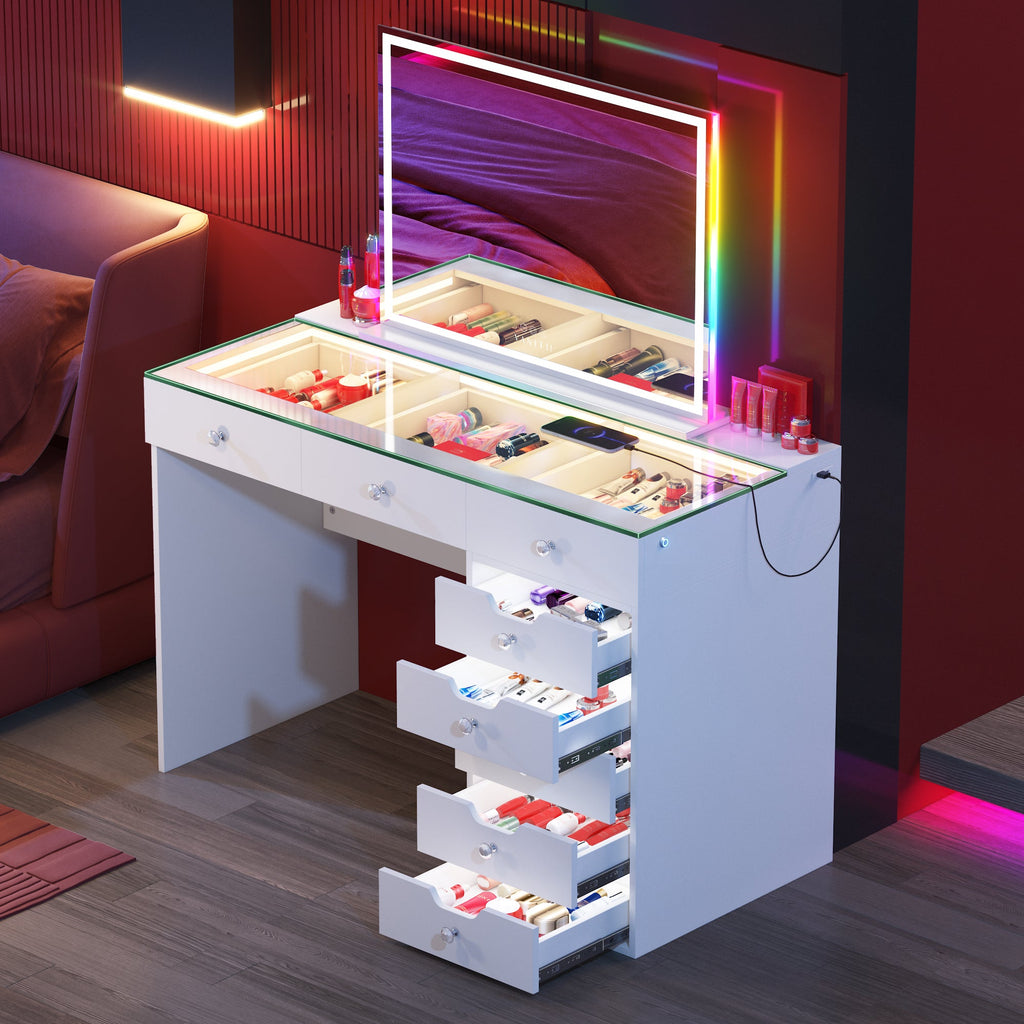 Vanitii Diana white vanity desk with glass top, lighted mirror, and eight storage drawers filled with cosmetics
