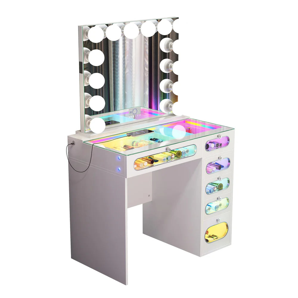 Modern white makeup vanity with illuminated Hollywood mirror, RGB LED glass top lighting, transparent storage drawers, and built-in cosmetic organizer compartments.