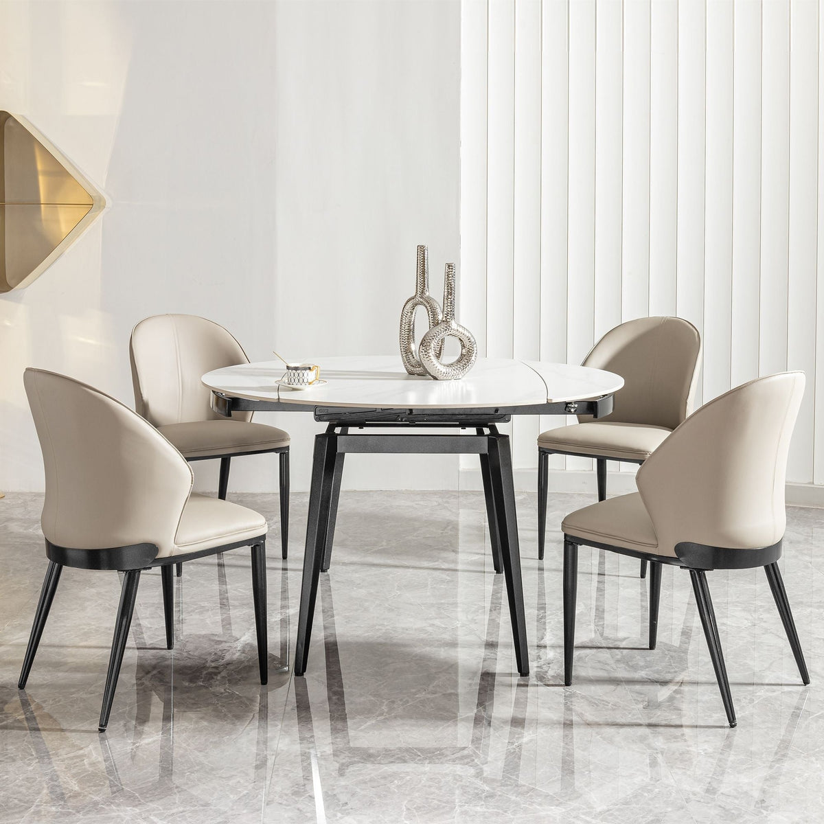 Dining room with a round table and four chairs in a modern interior setting.
