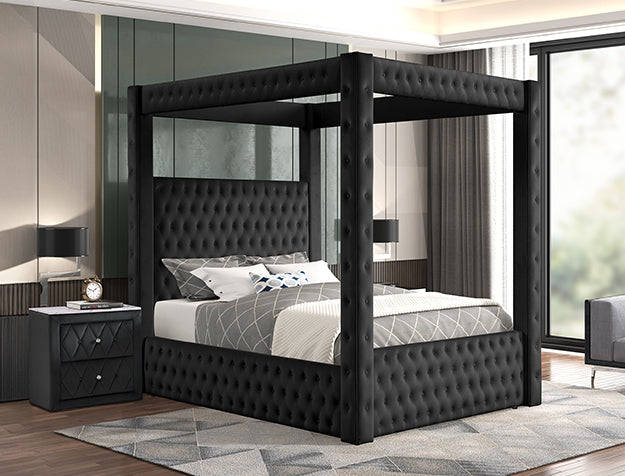 Black tufted canopy bed in a modern bedroom setting with large windows.