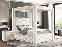 White canopy bed in a bedroom setting with nightstands and a mirror.