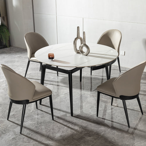 Dining table with four chairs in a modern interior setting