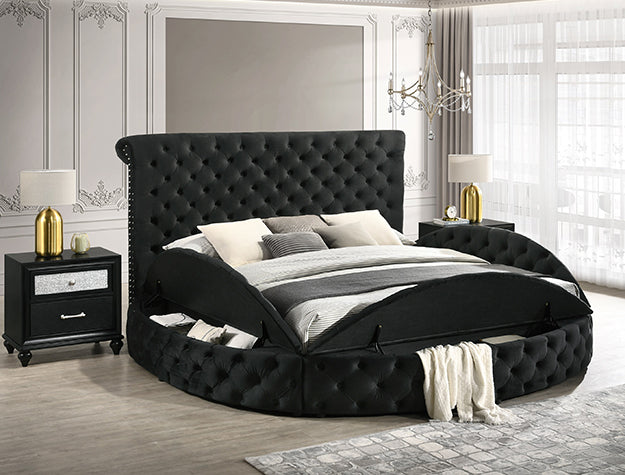 Black tufted bed in a stylish bedroom with matching nightstands and decor.