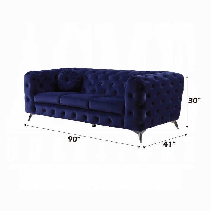 Navy blue tufted sofa with dimensions on a white background