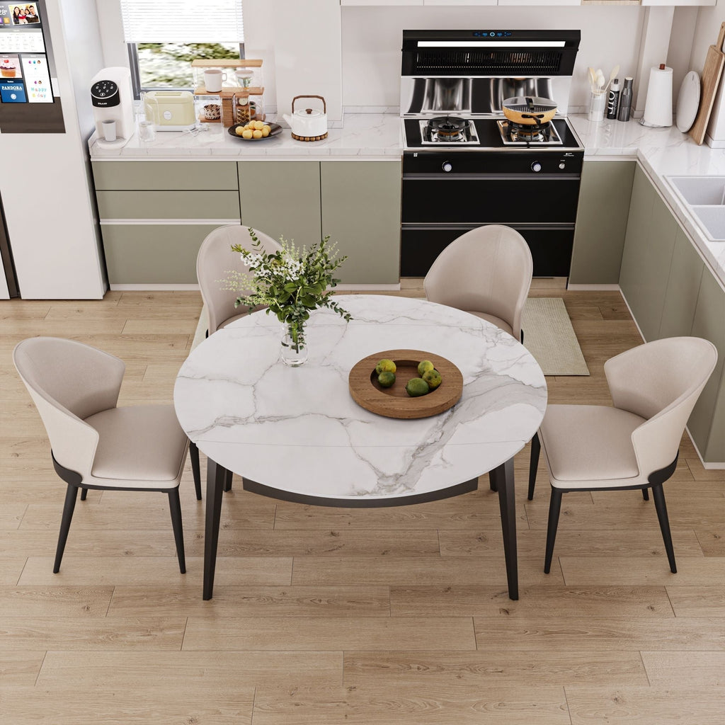 Dining area with a marble table and chairs in a modern kitchen.