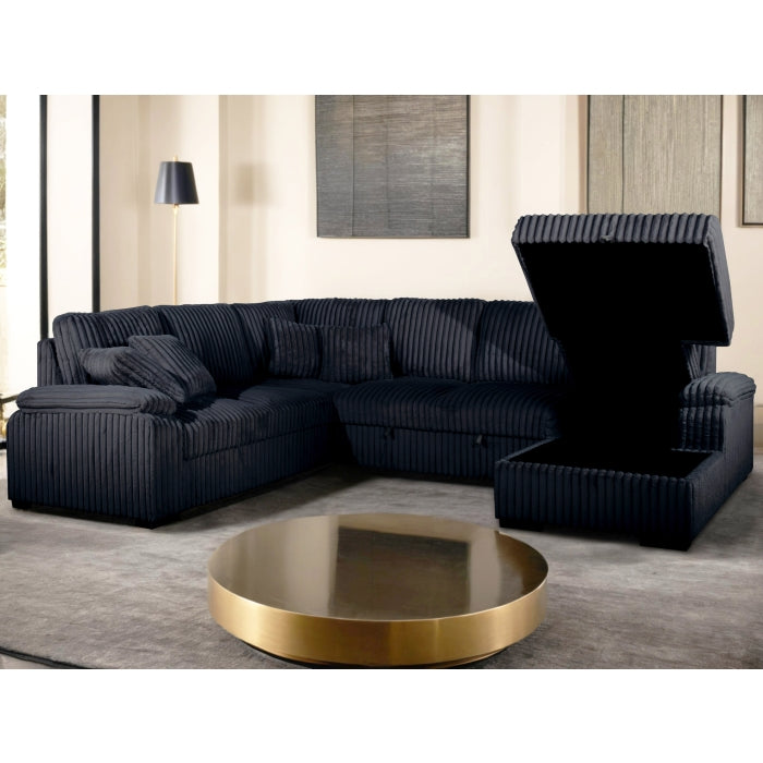 Black sectional sofa in a living room.