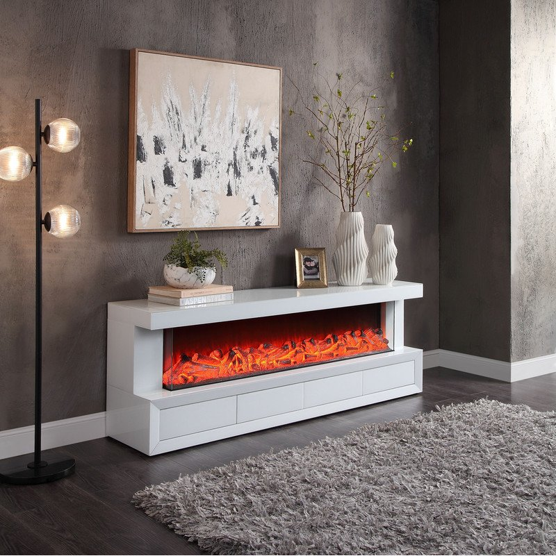 Modern living room with a white electric fireplace, decorative items, and abstract art on the wall.
