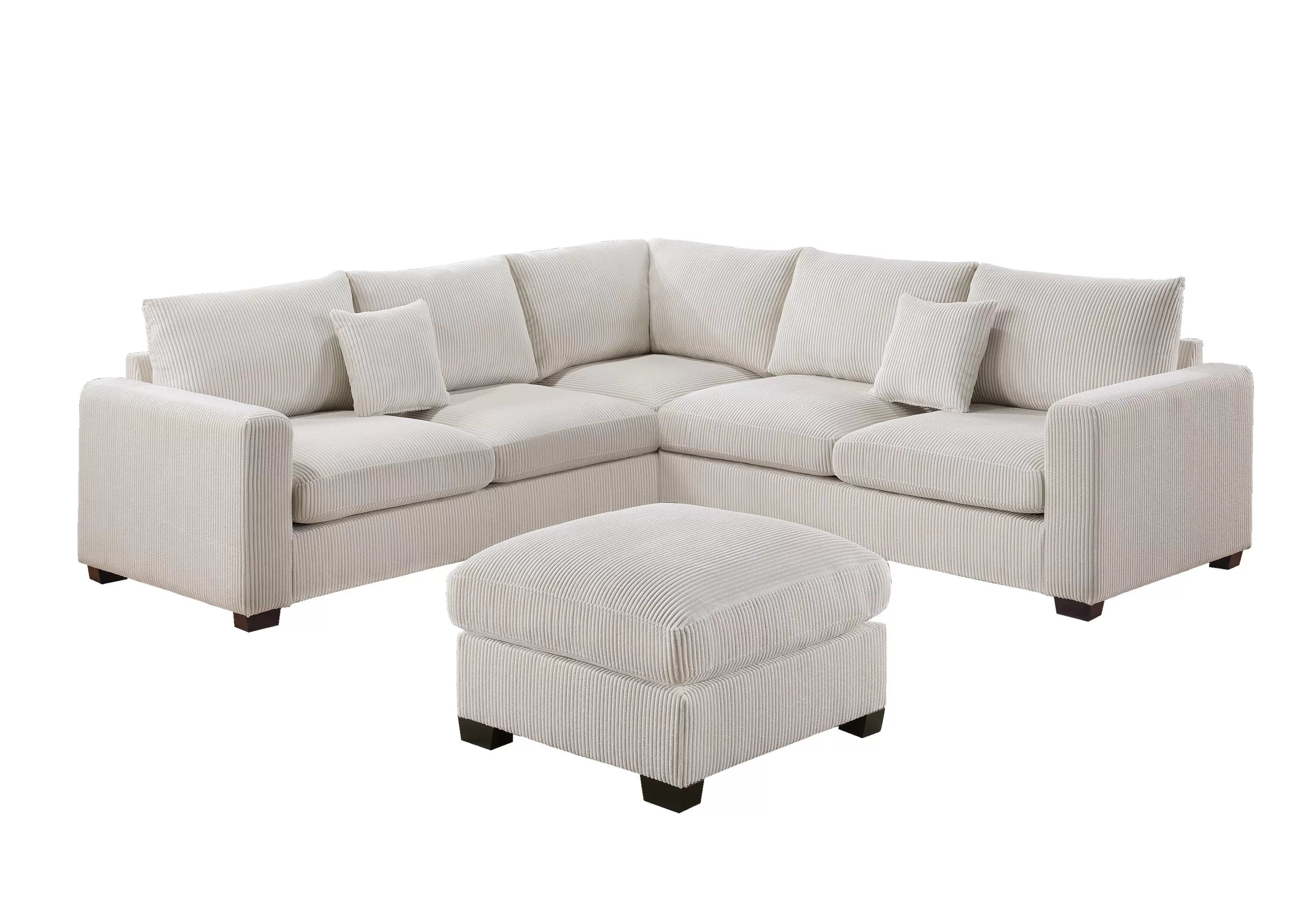 Beige sectional sofa with matching ottoman on a white background