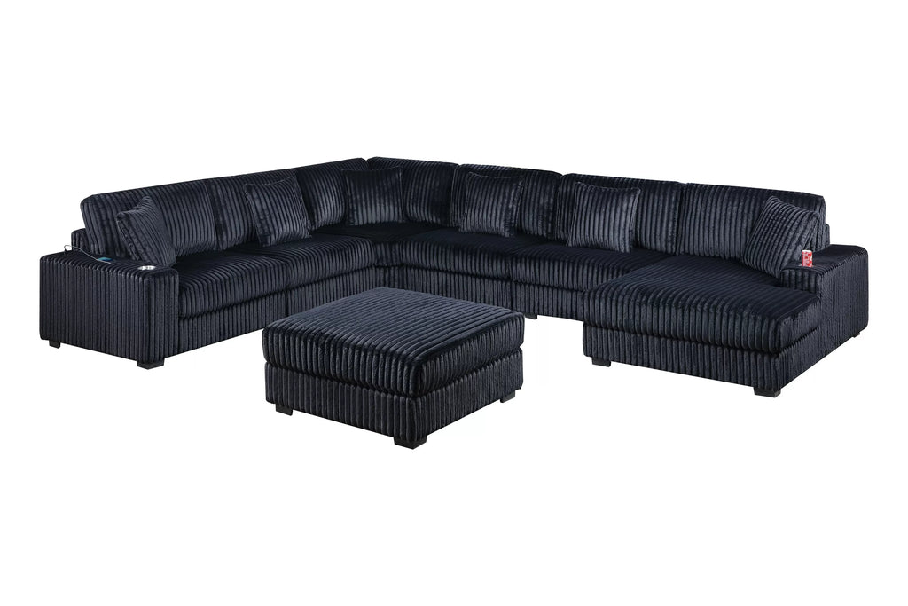 Black corduroy sectional set in white background.