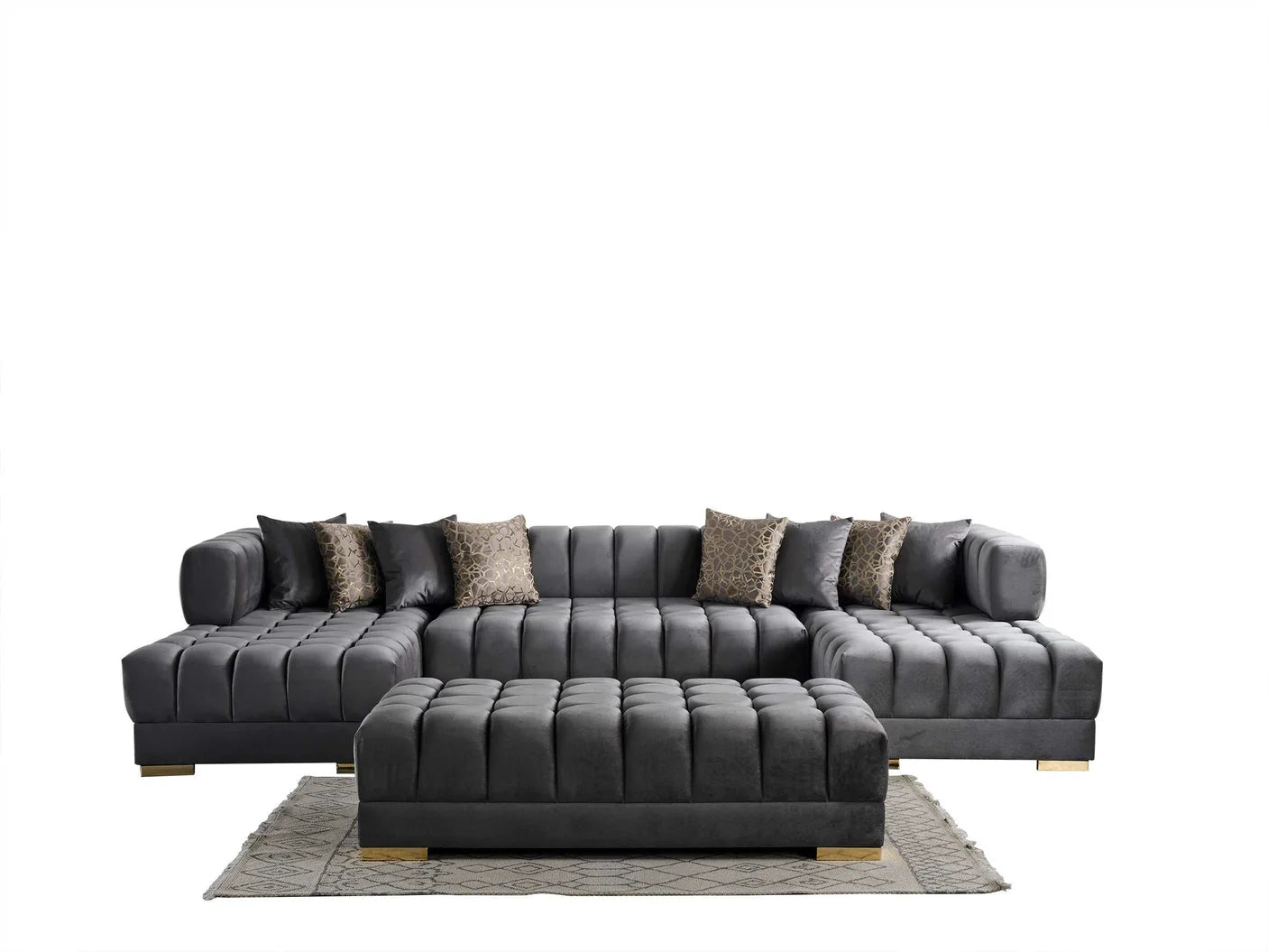 Gray sectional sofa with patterned cushions and a matching ottoman on a white background