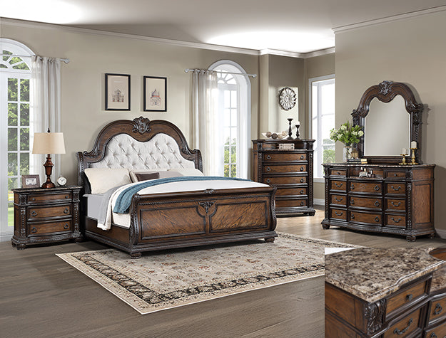 Luxury bedroom set with wooden furniture including bed, dresser, and nightstands.