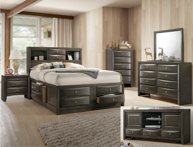 Bedroom furniture set with bed, dresser, mirror, nightstand and TV stand in a room with wooden flooring and large windows.