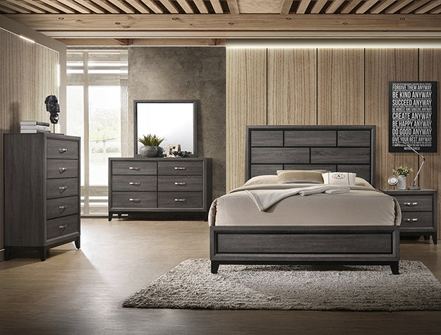Wooden bedroom furniture set with bed, dressers, and mirror in a room with wooden flooring and walls.