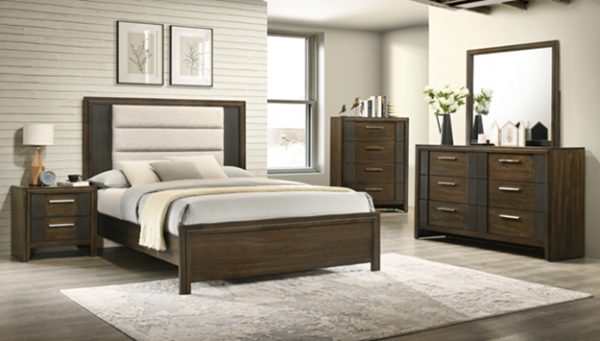 Wooden bedroom furniture set with bed, dresser, and mirror in a room.