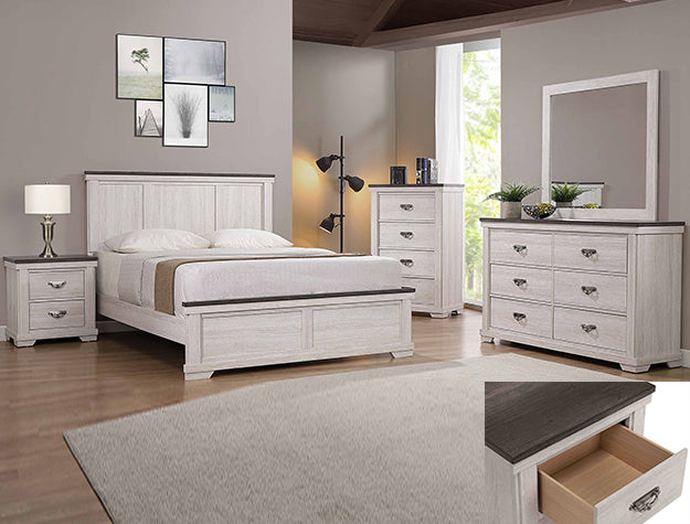 White bedroom furniture set with bed, nightstands, dresser, and mirror in a room.