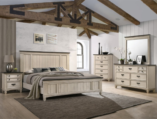 Neatly arranged bedroom with wooden furniture including a bed, nightstands, and dressers.