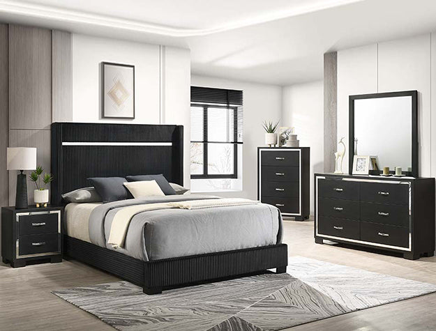 Modern bedroom set with black furniture and gray bedding.