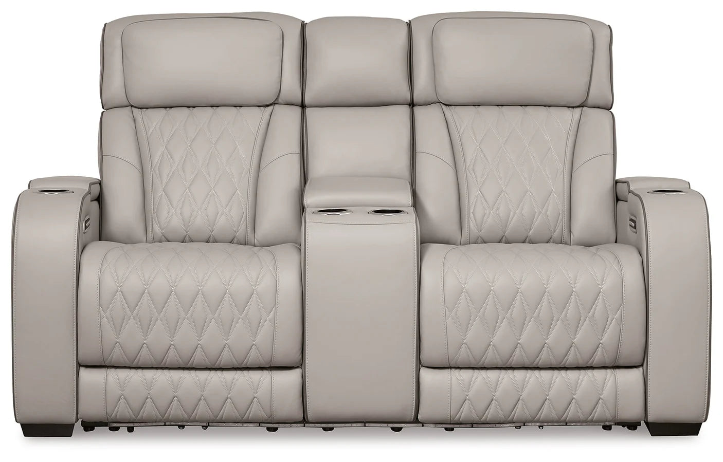 Gray recliner sofa with quilted pattern on a white background