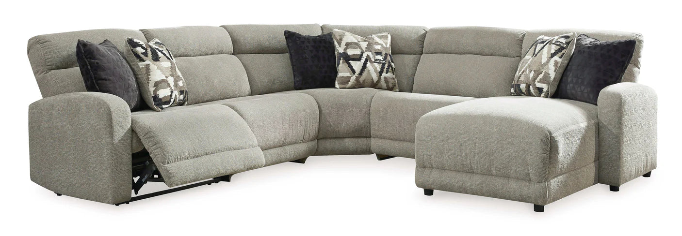 Gray sectional sofa with cushions on a white background