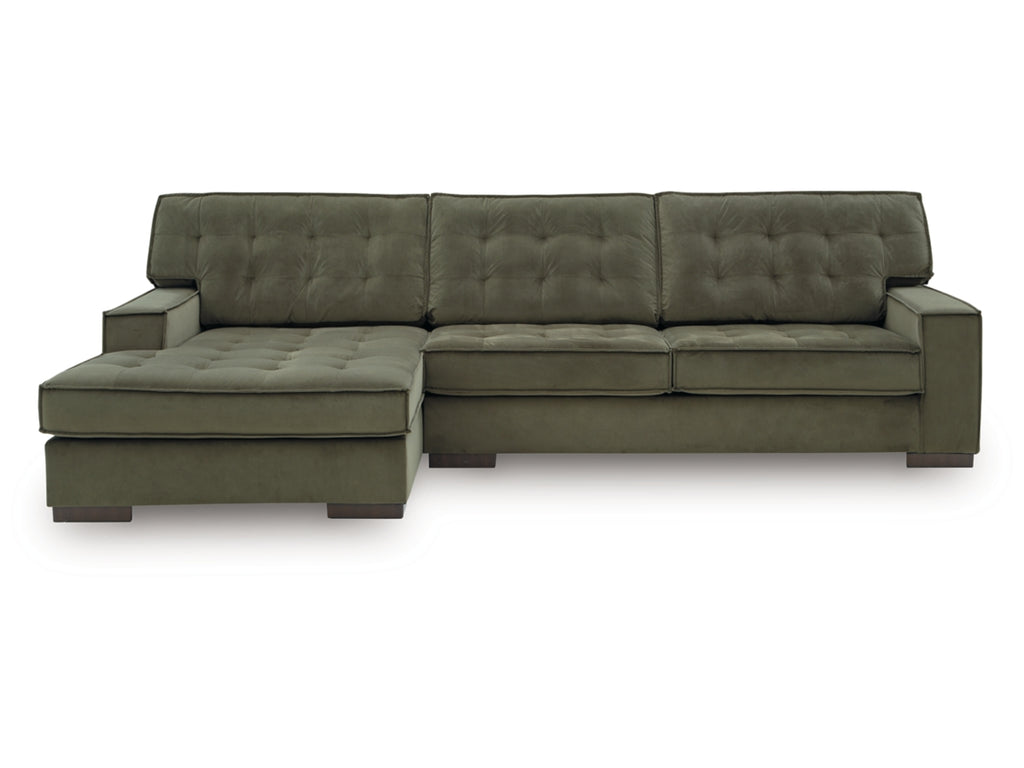 Green sectional set on a white background.