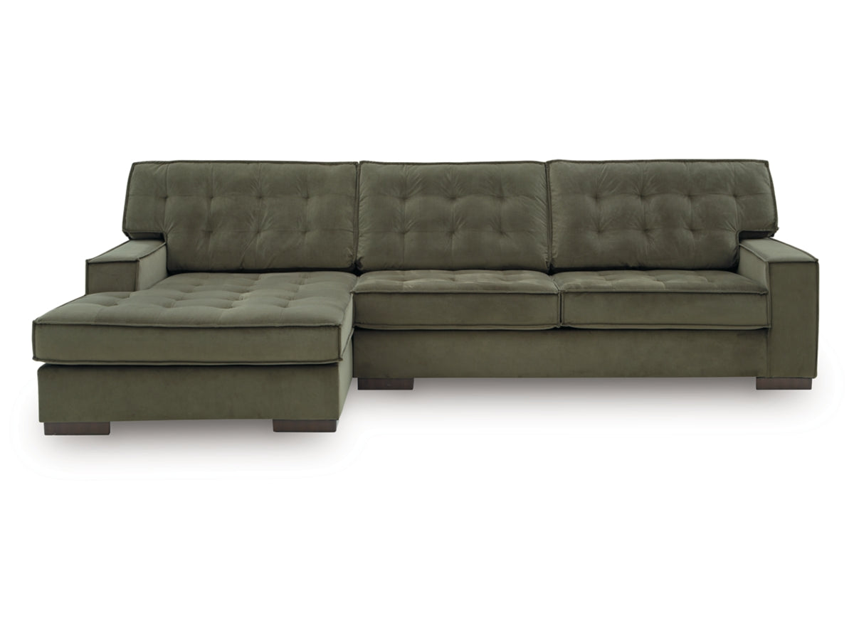 Green sectional set on a white background.