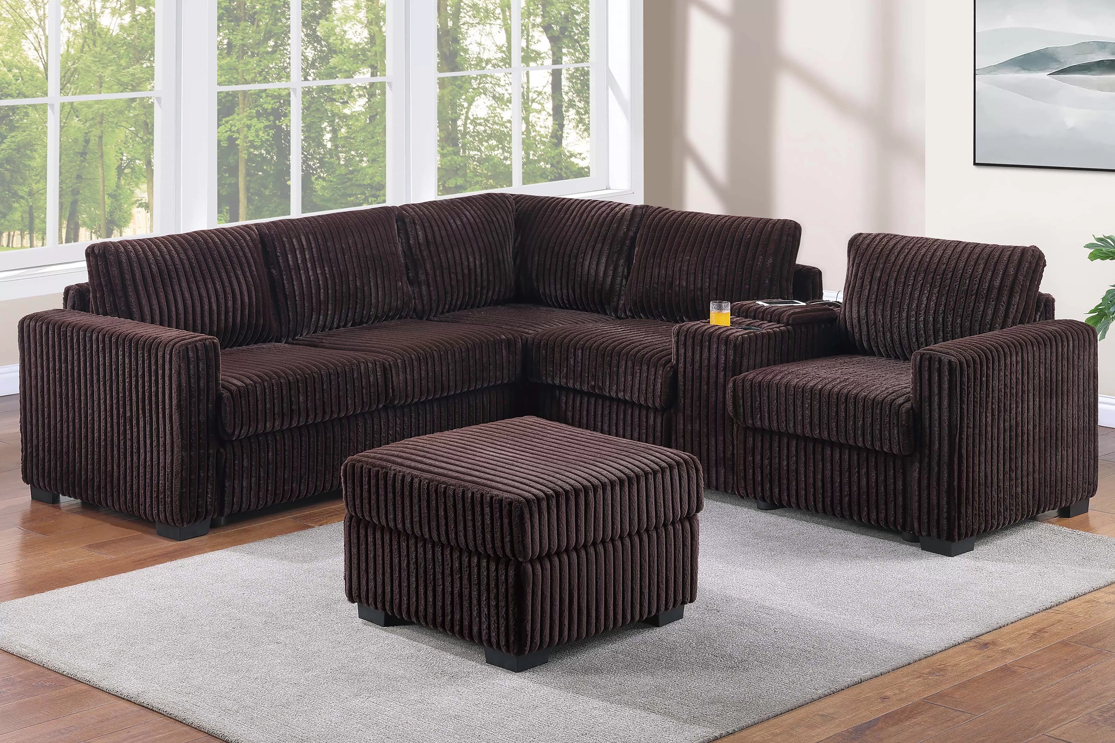 Brown sectional sofa with ottoman in a living room setting
