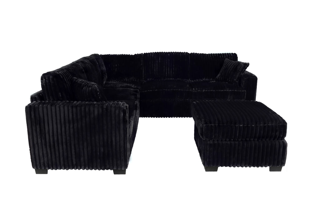 Black ribbed sectional sofa with ottoman on a white background