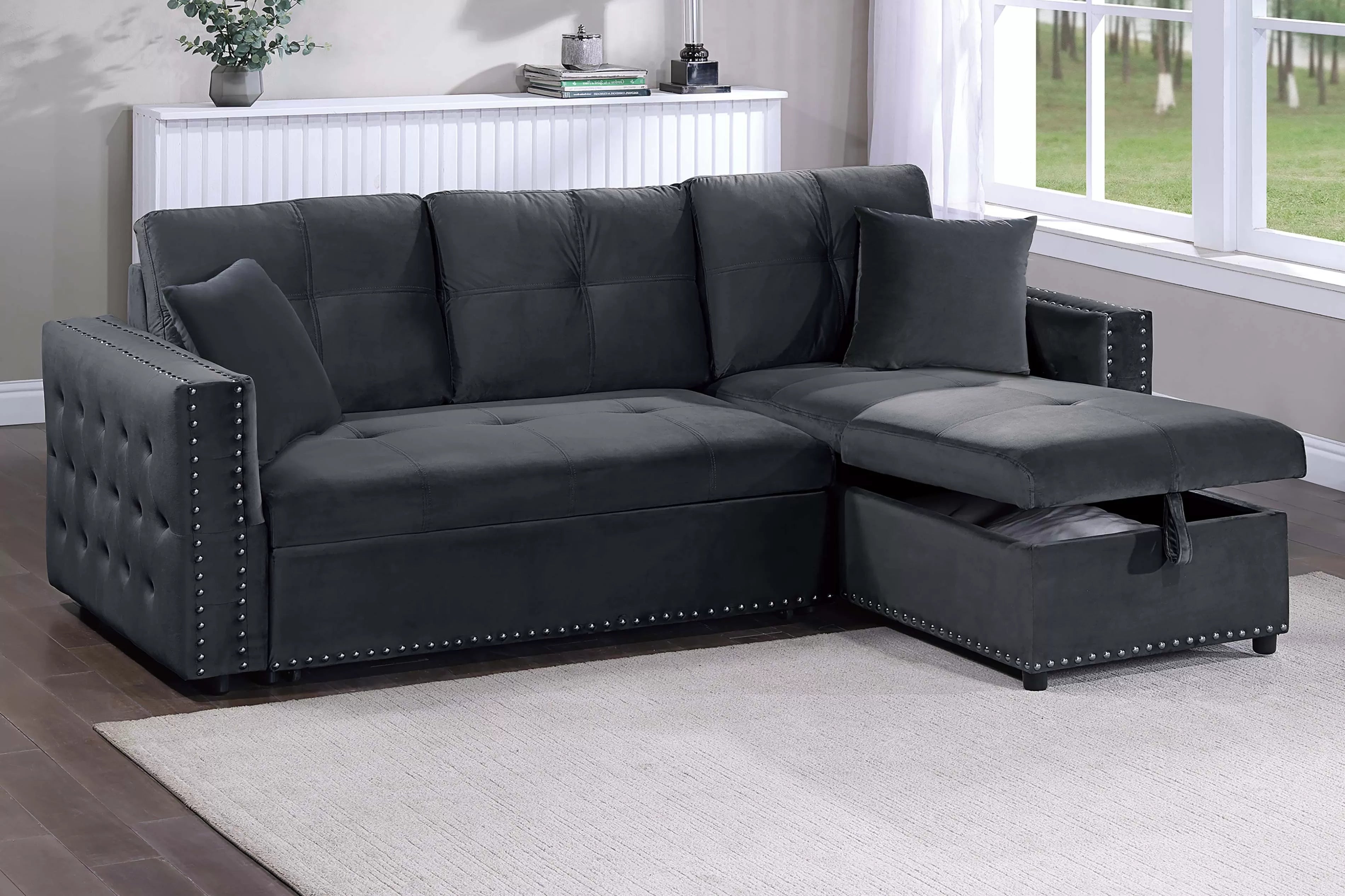 Gray sectional sofa with storage in a living room setting.