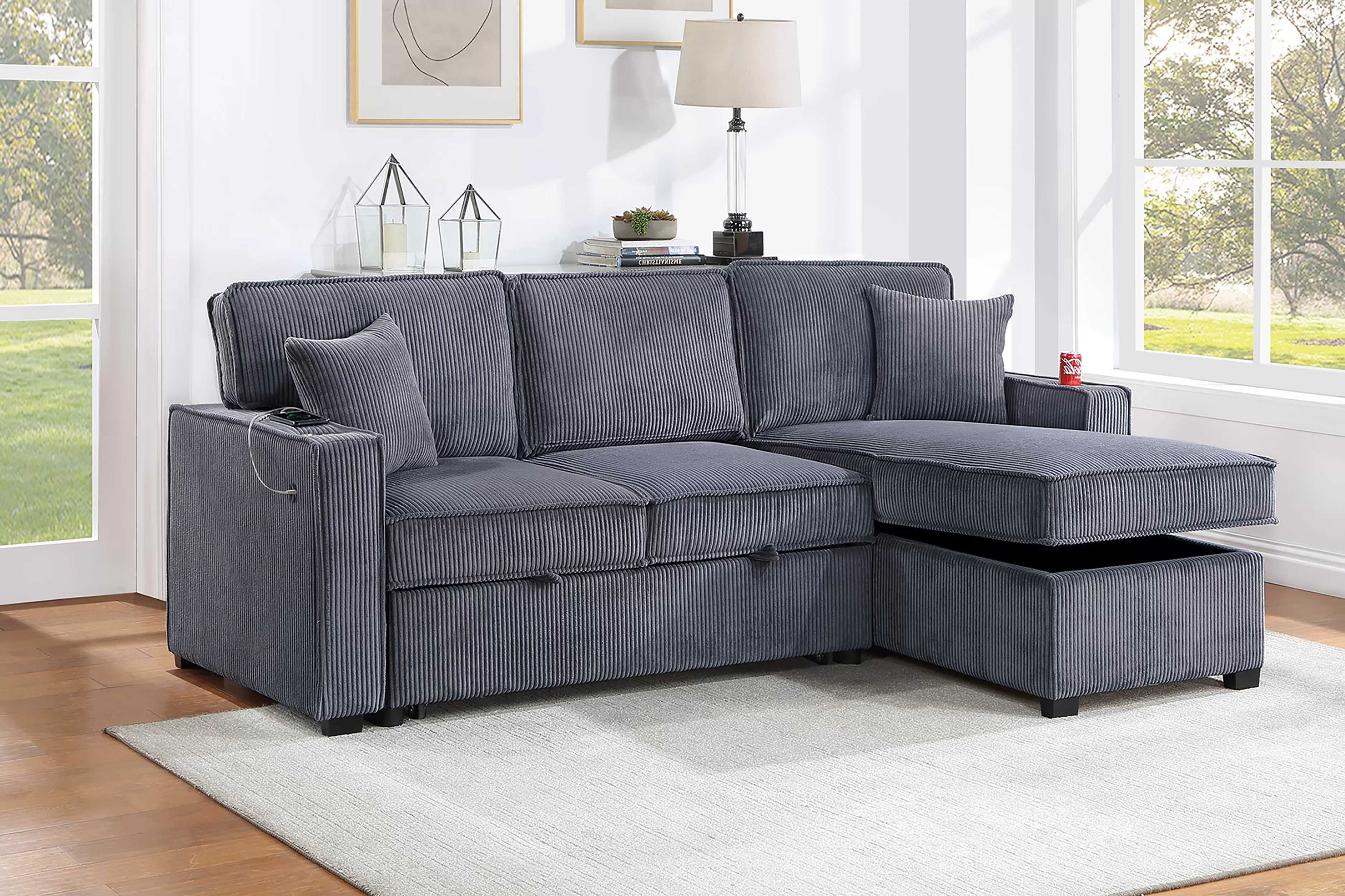 Gray sectional sofa with storage in a living room setting