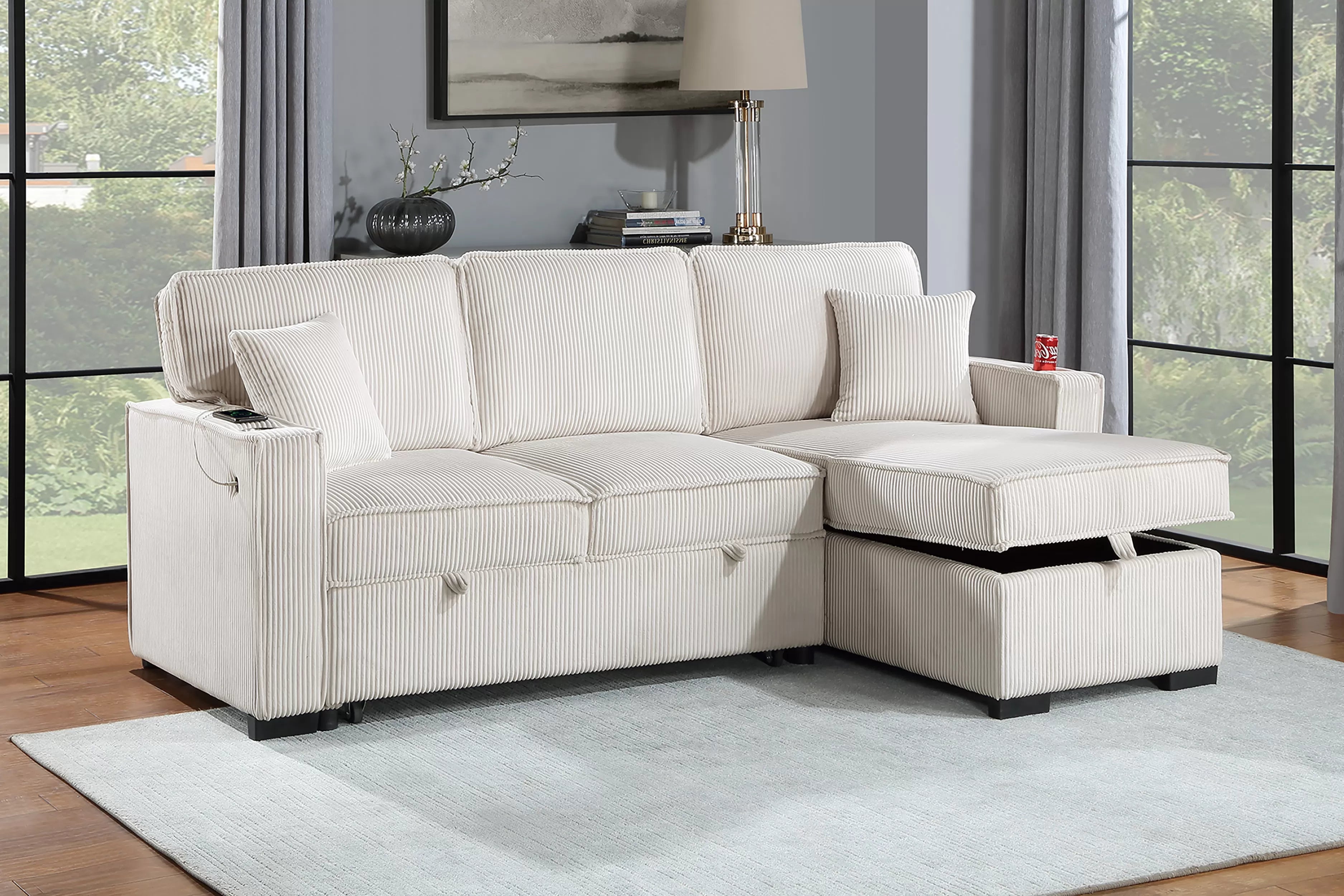 White sectional sofa with storage in a living room setting