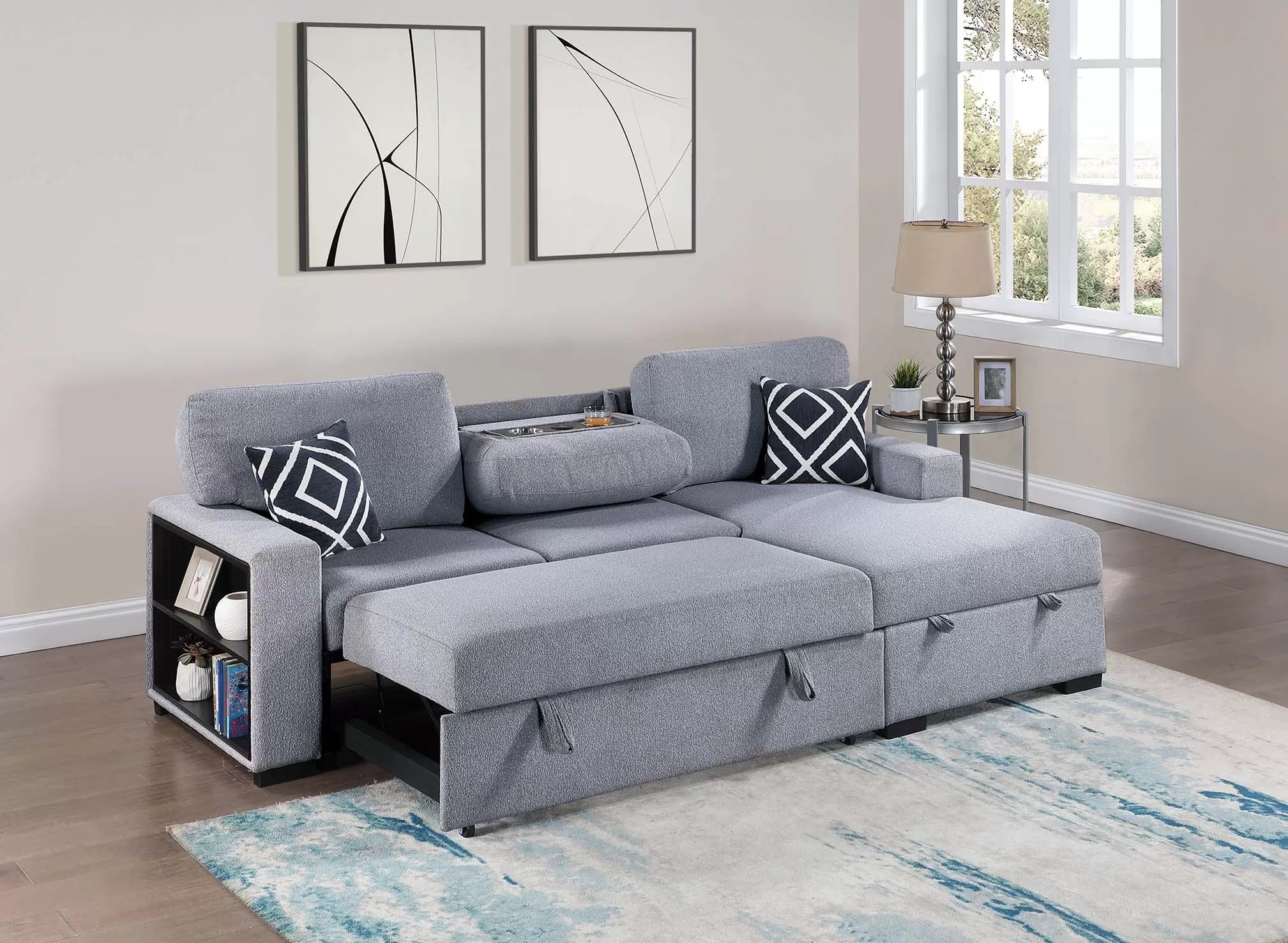 Gray sectional sofa with storage drawers in a living room setting.