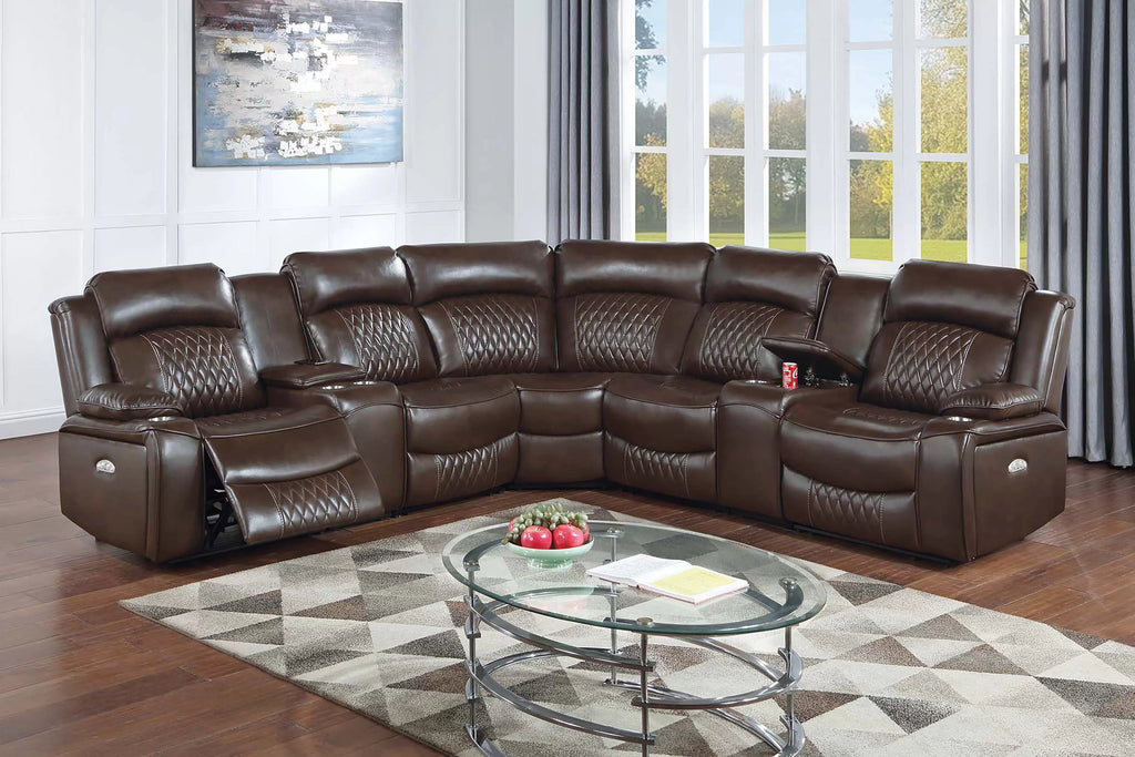 Brown leather sectional sofa in a living room with a glass coffee table and decorative items.