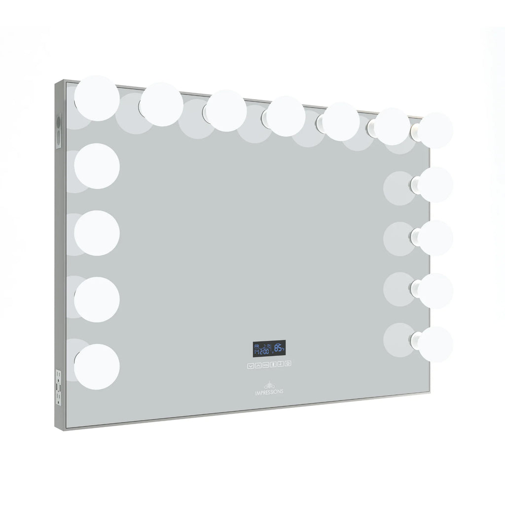 Large Hollywood-style vanity mirror with bright LED globe bulbs, touch controls, built-in digital clock display, Bluetooth speaker, and side power outlets.