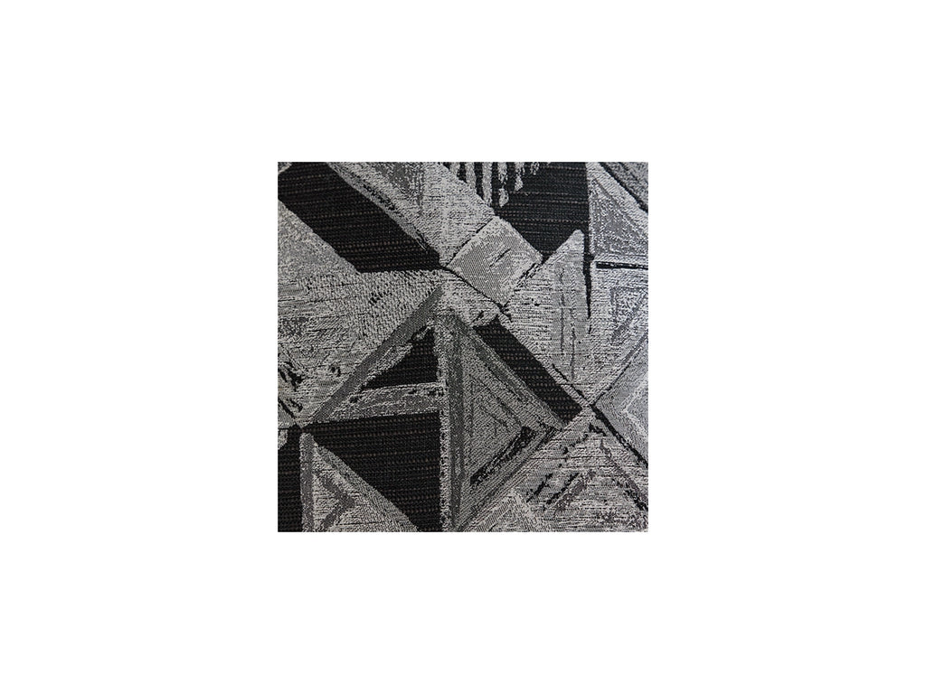 Black and white geometric pattern on a textured surface