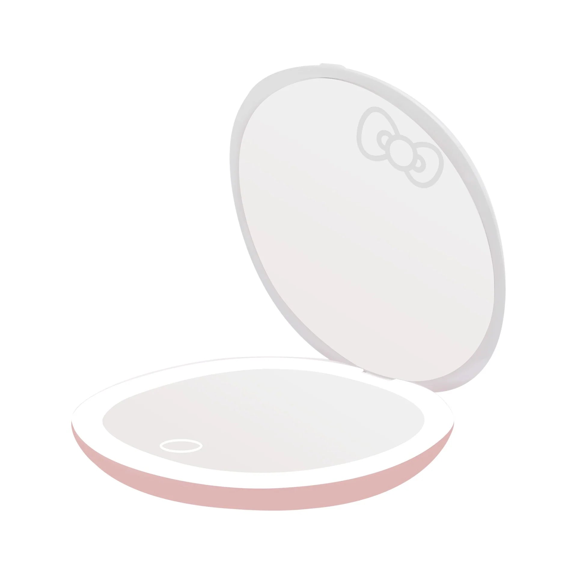 Round, light-colored compact mirror with a pink base on a white background