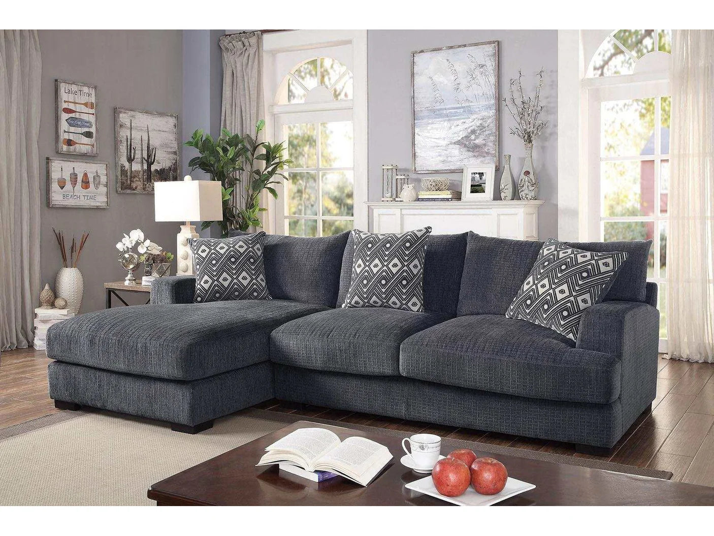 Gray sectional sofa in a living room with decor elements.