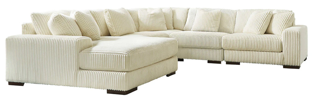Beige sectional sofa on a white background