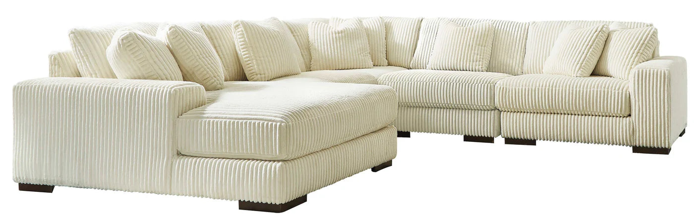 Beige sectional sofa on a white background