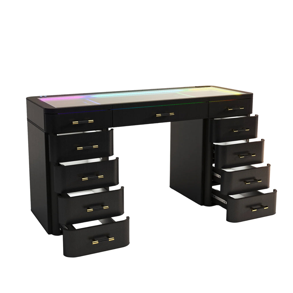 Modern black vanity desk with RGB LED glass top lighting, multiple soft-close drawers, gold hardware, and contemporary curved design.