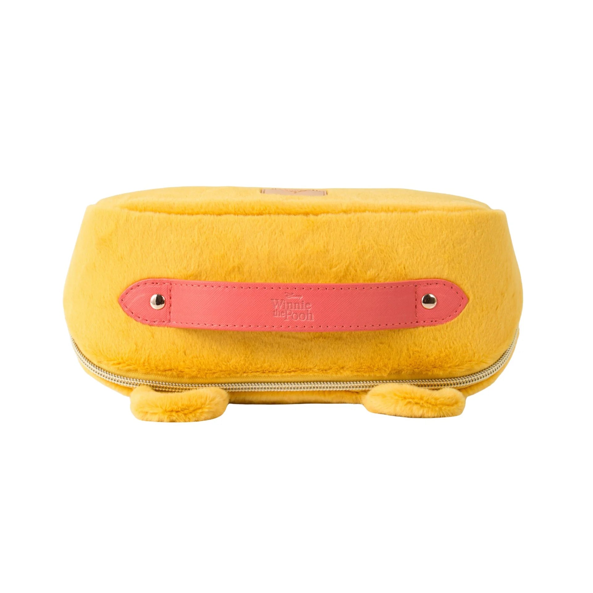 Yellow pouch with a pink strap on a white background