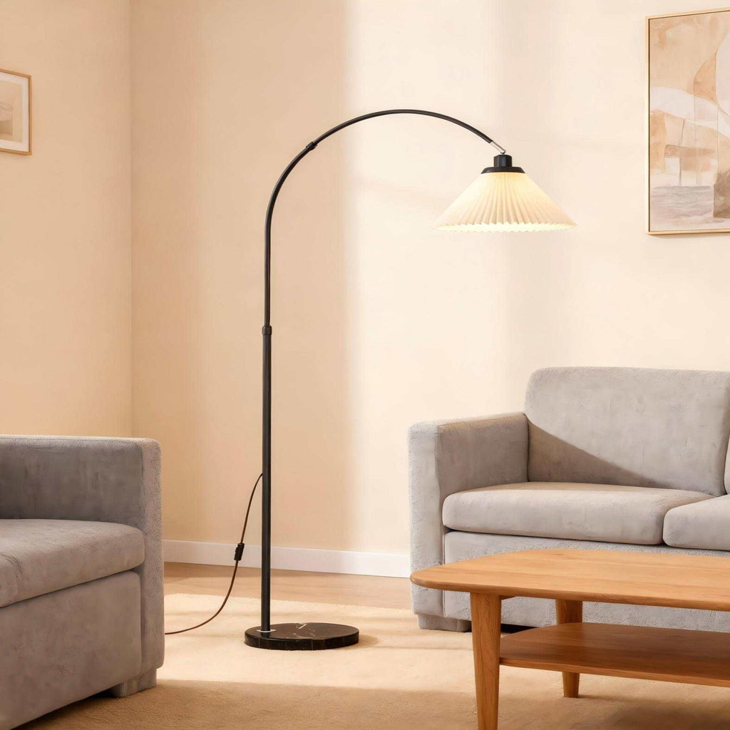 Black Arc Floor Lamp - Modern "fishing lamp" with soft pleated shade, ideal for sofa-side reading in living rooms and bedrooms