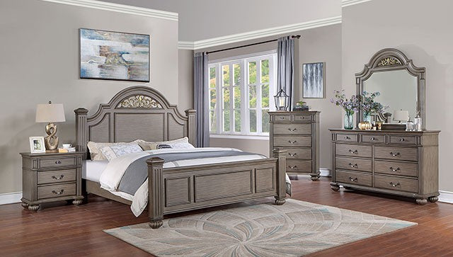 Wooden bedroom furniture set with bed, nightstands, and dresser in a room.